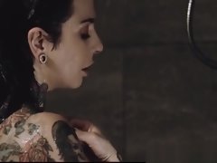 Tatted milf les showers and makes out