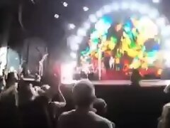 Public cock sucking at a concert