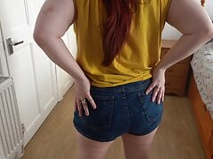Shy Step Mom posing and stripping in tight shorts and tight yellow Shirt