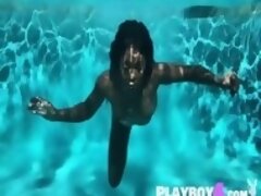 Big ass ebony babe enjoys masturbation in the pool after posing