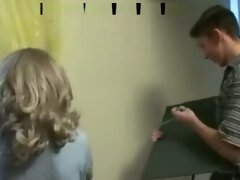 Son Helps Not His Mom Hang Curtains