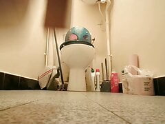peeing at toilet wearing heels ans pantyhose
